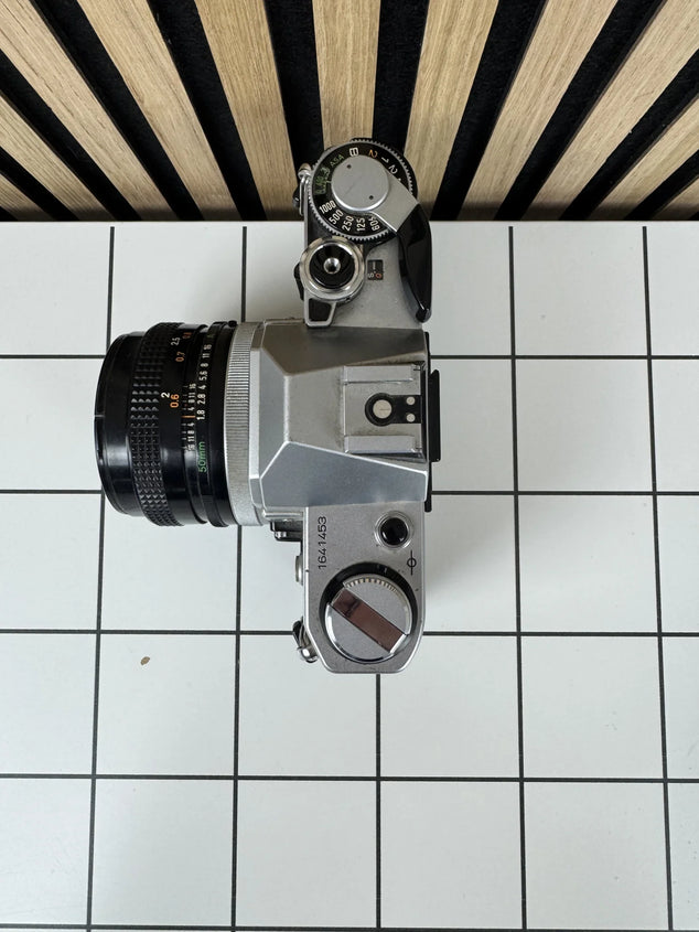 AE-1 zilver + FD 50mm f/1.8 occasion