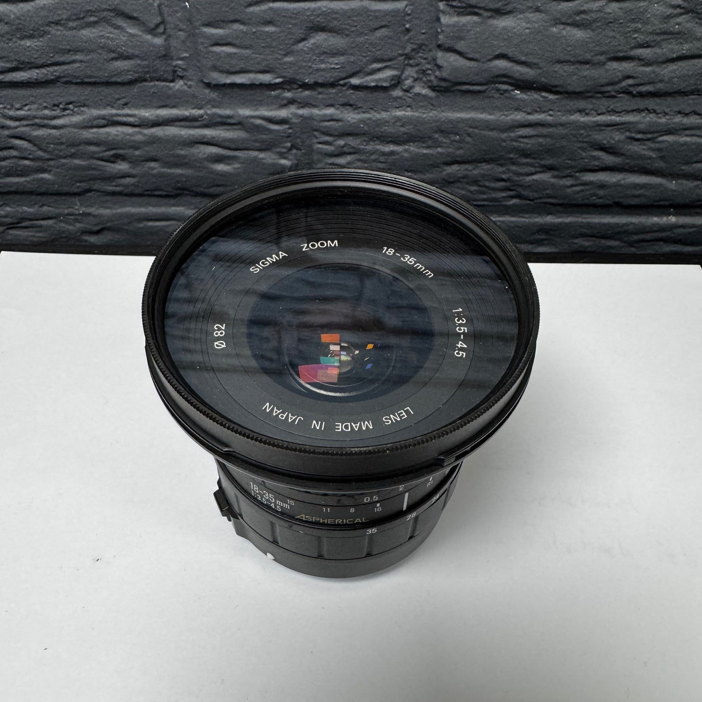 Objectif asphérique Sigma 18–35 mm f/3.5–4.5 (Canon EF) + filtre Rodenstock Skylight 82 mm | Occasion, état impeccable